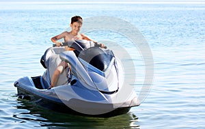 A boy on a jet ski