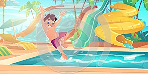 Boy jump in pool in aqua park with water slides