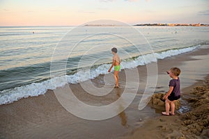 Boy jumping freedom in the beach