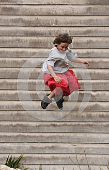 Boy jumping off building