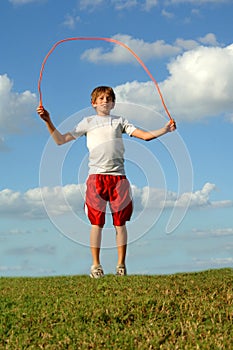 Boy jumping rope