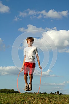Boy jumping rope