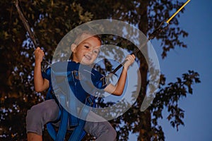 Boy jumping on the trampoline