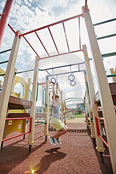 Boy in Jungle Gym