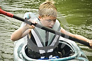 Boy in Kayak/Concentration