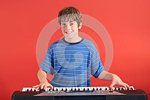 Boy on keyboard straight