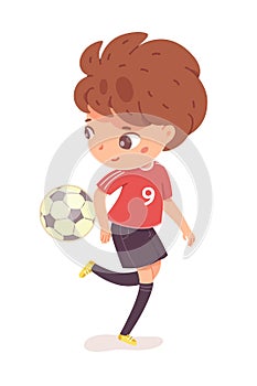 Boy kicking ball by leg at football practice. Happy little kid playing sport in uniform vector illustration. Smiling