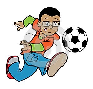 Boy kicking a soccer ball photo