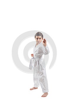 Boy in a kimono practicing martial arts and jiu jitsu