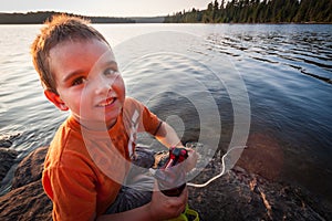 Boy by the lake