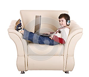 Boy with laptop and headphone.