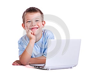 Boy with laptop on white