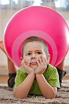 Boy with large ball