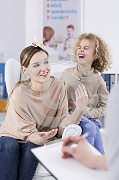 Boy laughing at his mother