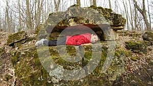 Boy Laying Between Two Rocks - Brady`s Rocks
