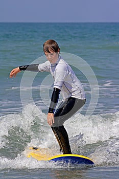 Boy learning to surf 1