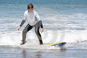 Boy learning to surf 2