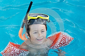 Boy learning to swim