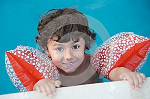 Boy learning to swim