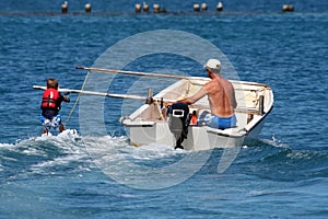 Boy learning waterski