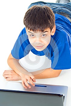 Boy learns a laptop