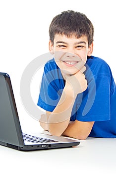 Boy learns lessons at a laptop