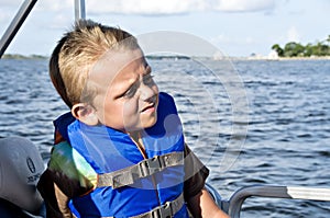 Boy in Life Vest Boating