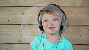 Boy listening to music on headphones