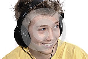 Boy listening to music with headphones.