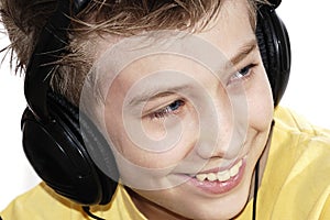 Boy listening to music with headphones.