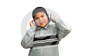 Boy listens attentively to the music.