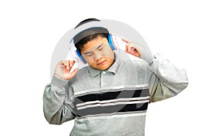 Boy listens attentively to the music.