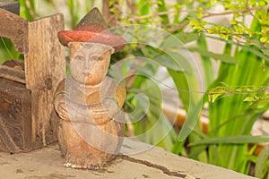 Boy lonely Sit sculptured wood