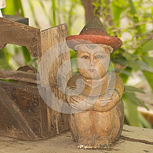 Boy lonely Sit sculptured wood , art