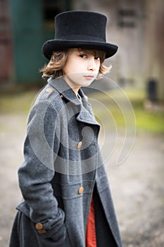 Boy in Long Coat and Top Hat