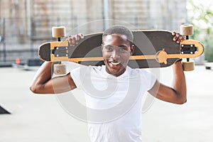 Boy with Longboard photo