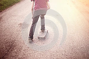 Boy on a longboard.