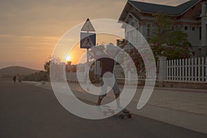 Boy on longboard skate