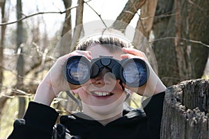 Boy Looking Through Binoculars