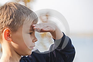 Boy looking at a distance