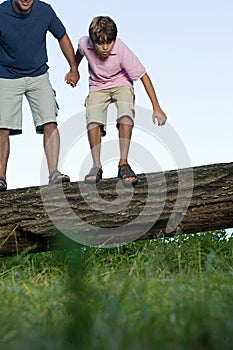 Boy looking at ground in awe