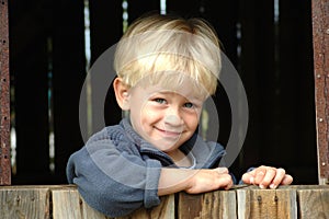 Boy looking out of window