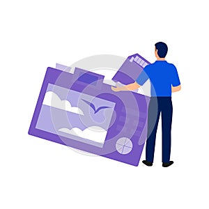 The boy is looking at the photos in the SD card of the camera