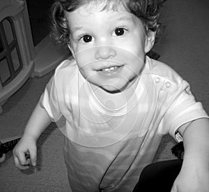 Boy looking up with a grin