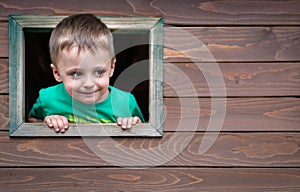 Boy looking through the window