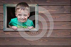 Boy looking through the window