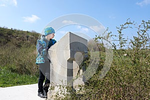 Boy looks at description of sights of Chersonese