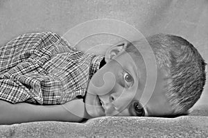 Boy lying down