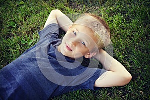 Boy Lying in Grass