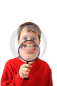 Boy and magnify glass